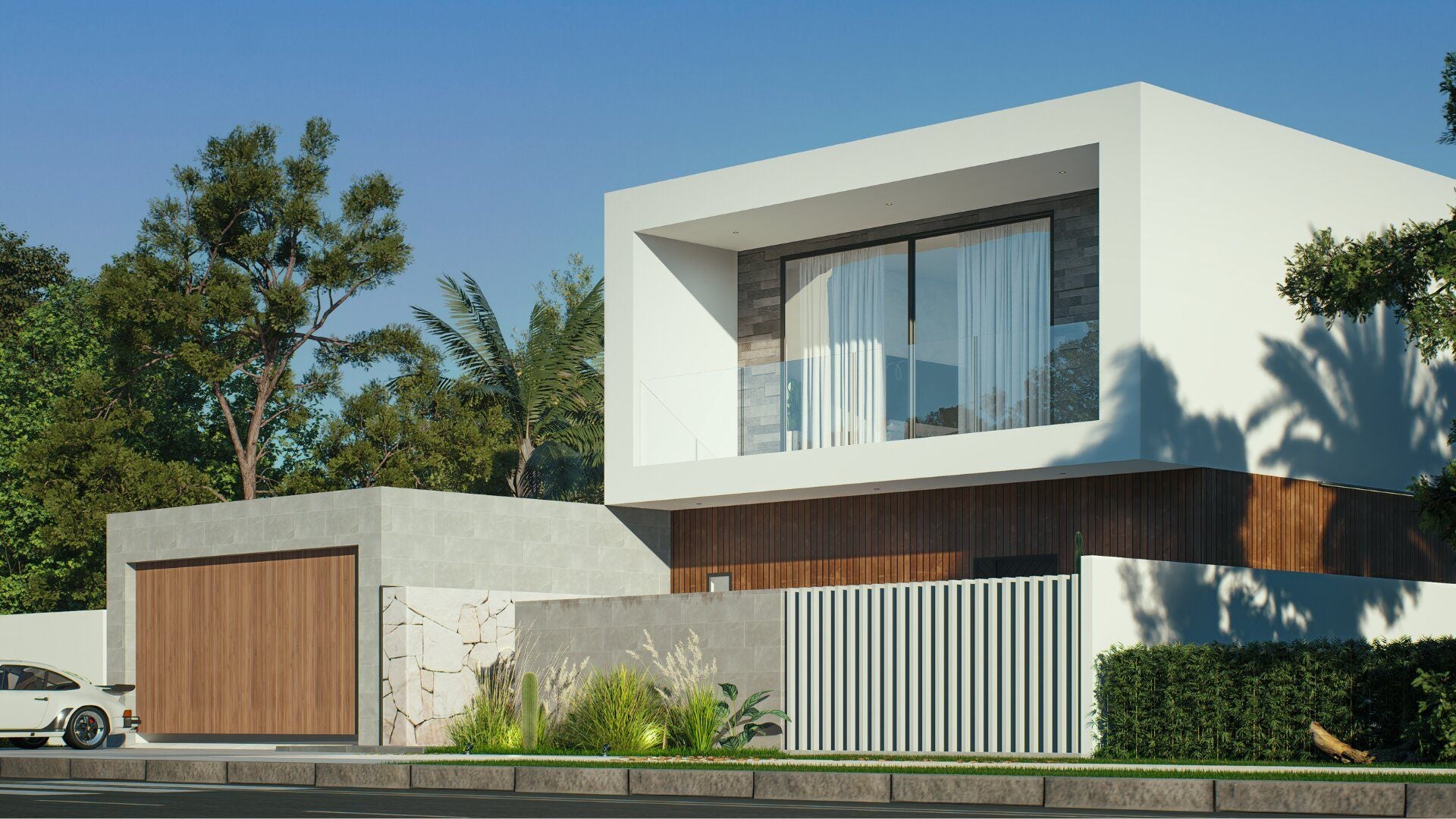 Modern house with a white facade and wooden accents, surrounded by trees and greenery.